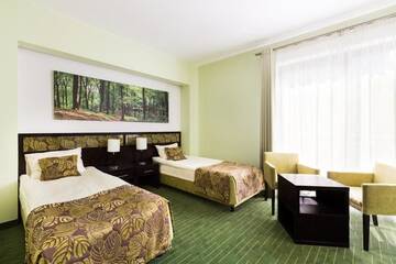 Фото номера Двухместный номер с 1 кроватью или 2 отдельными кроватями Отель Hotel Uroczysko г. Cedzyna 9