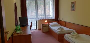Фото номера Двухместный номер с 2 отдельными кроватями Отель Hotel Echo г. Cedzyna 4